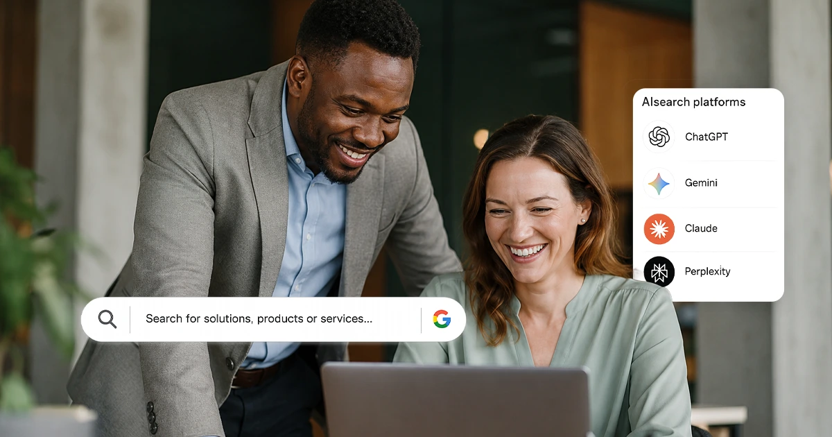 Two business professionals reviewing SEO strategy on a laptop — Ranked by Moed, Johannesburg